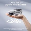 DJI Mini 4K, Drone with 4K UHD Camera for Adults, Under 249 g, 3-Axis Gimbal Stabilization, 10km Video Transmission, Auto Return, Wind Resistance, 31-Min Max Flight Time, Intelligent Flight. 