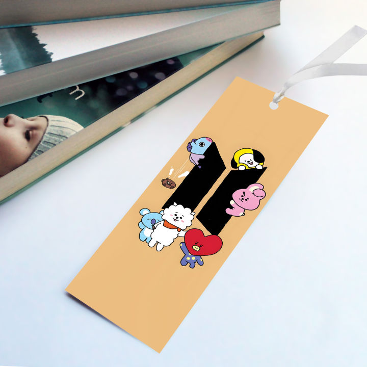 BT21%20x%20BTS%20Logo%20Bookmark%20%7C%202x6%20Inch%20%7C%20Cute%20K-Pop%20Bookmark%20with%20RJ,%20Chimmy,%20Cooky%20&%20More%20%7C%20Gift%20for%20ARMYs%20-%20Image%203
