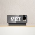 Digital LED projection clock temperature and date display. 