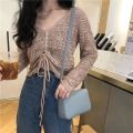 Spring and Summer New Hollow Sweater v Collar Short Loose Women's Long Sleeve Net Hole Top Drawstring Blouse Thin Sweater Women. 