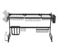 Double sink stainless steel dish drying rack over sink with cutlery holder. 