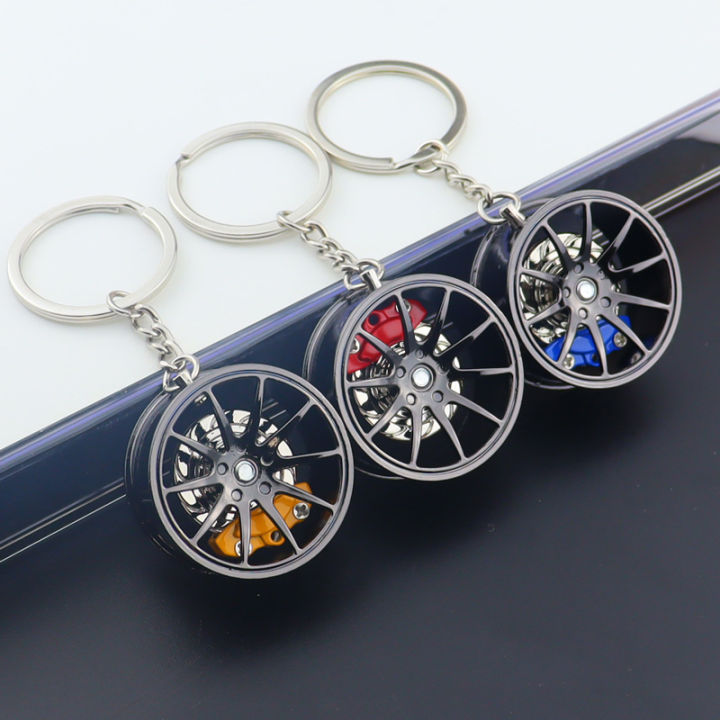 Car Fidget Keychains Wheel Hub Car Key Chain Fidget Toy Car Tire Brake Disc Keychain ...