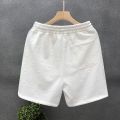High Quality Letter Jacquard White Shorts Men's Fashion Casual Lace up Sports Pants Men's Home Four-Point Beach Pants. 