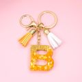 Orange Color 26 Initials Letter Keyrings with Tassels Handbag Key Chain Pendant Ornaments Acrylic Alphabet Keychains Accessories. 
