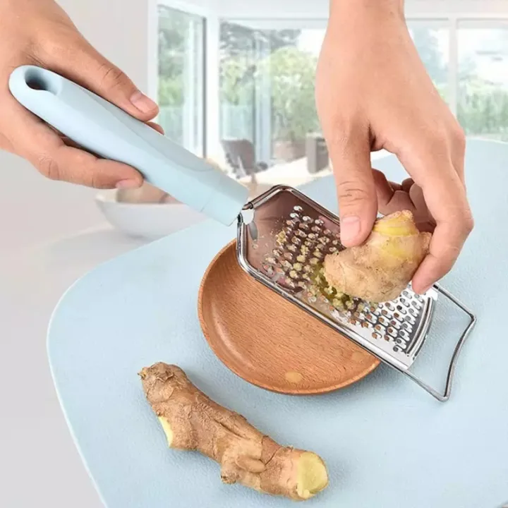 KITCHEN%20SUPPLIES/%20FINE%20KITCHEN%20SERIES%20HOME-II/%20STAINLESSSTEEL%20PEELER/%20PEELER/GRATER/%20garlic%20slicer/%20ginger%20slicer/%20garlic%20&%20ginger%20peeler%20-%20Image%202
