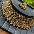 Dull gold color chocker necklace with one pair earring and one nalal theli with gold stone for girl and women. 