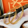 Gold plated Two line Charm Bangle Stylish Rich Look Guaranteed Without Stone For Women gift items for girls. 