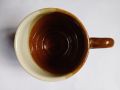 Brown color tea mug. 