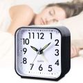 Square Simple Alarm Clock Battery Powered Time Clock Ornament for Home Bedroom Dormitory Party Background. 
