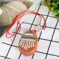 4X 8 Key Mini Kalimba Exquisite Finger Thumb Piano Marimba Musical Good Accessory Pendant Gift. 
