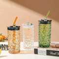 good quality glass with lid and  glass straw 380ML.. 