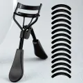 1 Portable Eyelash Curler with 15 Silicone Pads, Stainless Steel Curved Handle Eyelash Curler, Curl and Shape, No Damage to Eyelashes, Eyelash Lifting, Big Eyes, Suitable for Women's Eyelashes. 
