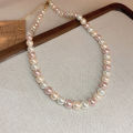 French high-end pearl necklace is fashionable and simple commuting versatile clavicle chain, niche design sense creative necklace women. 