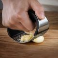 Stainless Steel Garlic Press Rocker , New Arc-shaped Design Professional Heavy Soft-Handled Garlic Crusher With Comfortable Grip (Garlic Press Black). 