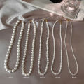 French high-end pearl necklace is fashionable and simple commuting versatile clavicle chain, niche design sense creative necklace women. 