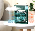 Mini Portable Air Cooler with Humidifier Function, 3 Speed Settings, Water Spray Feature, LED Color Lights, and USB Connectivity for Personal Use. 