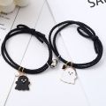 Trendy Black and White Halloween Couple Bracelets with Love Heart Pendant - Adjustable Rubber Band, Matching Set. 