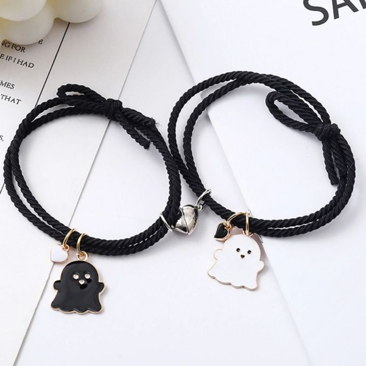 Trendy%20Black%20and%20White%20Halloween%20Couple%20Bracelets%20with%20Love%20Heart%20Pendant%20-%20Adjustable%20Rubber%20Band,%20Matching%20Set%20-%20Image%207
