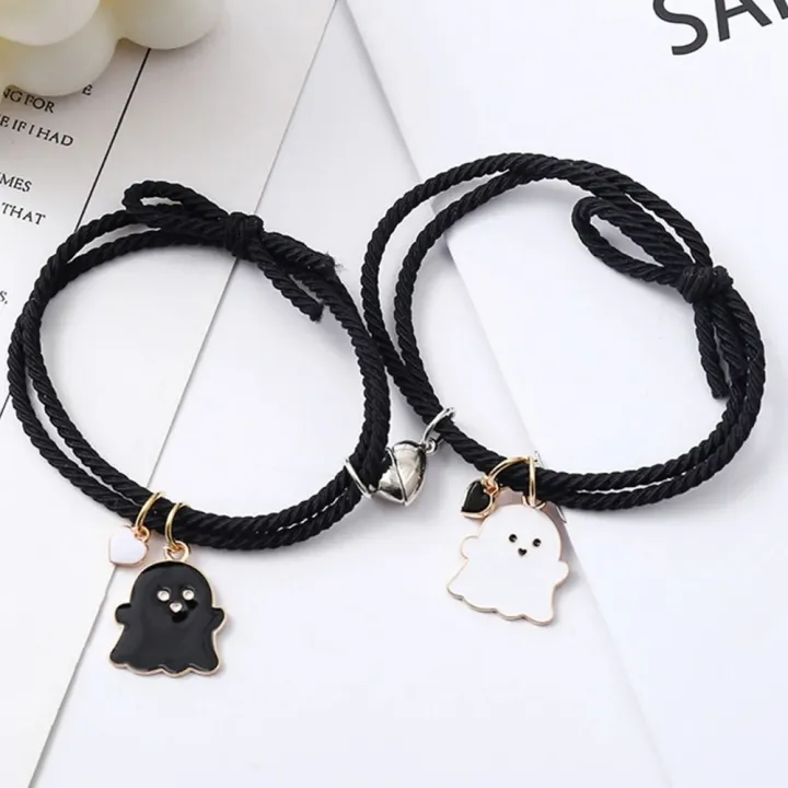 Trendy%20Black%20and%20White%20Halloween%20Couple%20Bracelets%20with%20Love%20Heart%20Pendant%20-%20Adjustable%20Rubber%20Band,%20Matching%20Set%20-%20Image%207