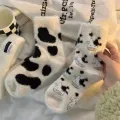 Autumn and Winter Fleece-lined Mink Fur Socks Women's Warm Thickened Cow Spot Home Cute Girl Room Socks Maternity Socks. 
