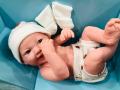 Small Soft Silicone Realistic Smiley Reborn Lifelike Newborn Baby Doll with Moveable Head Arms And Legs Real Looking Newborn Baby Doll Toys for Kids. 