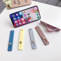 Candy color finger ring holder mobile phone holder stand push pull sticker paste universal hand band phone holder. 