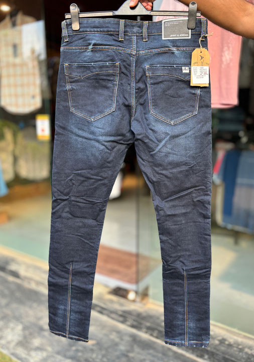 Jimmy%20Jordan%20%20Original%20Denim%20Trouser%20%20Men's%20denim%20JEANS%20BLUE%20%20DARK%20BLUE%20%20%20Introducing%20the%20Jimmy%20Jordan%20Original%20Denim%20Trouser%20for%20men,%20available%20in%20a%20stylish%20dark%20blue%20wash%20color.%20These%20jeans%20are%20perfect%20for%20casual%20wear%20and%20feature%20a%20trendy%20ripped%20decorat%20-%20Image%203