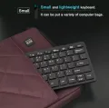 K-1000 Mini Office Keyboard: 78-Key Compact Wired USB Powered Keyboard for Home & Work (Black). 