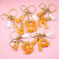 Orange Color 26 Initials Letter Keyrings with Tassels Handbag Key Chain Pendant Ornaments Acrylic Alphabet Keychains Accessories. 