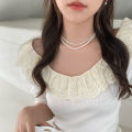 French high-end pearl necklace is fashionable and simple commuting versatile clavicle chain, niche design sense creative necklace women. 