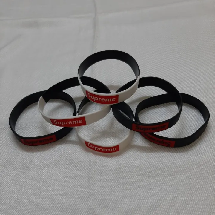 One%20Free%20Size%20Rubber%20Stretchable%20Supreme%20Wristband%20Bracelet%20For%20Men%20Events%20Party%20Sports%20&%20Daily%20Wear%20(Black,%20Black%20&%20White%20Mix%20Color%20)%20-%20Image%209