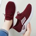 Women's shoes breathable running striding fly netting shoes ladies spring and summer new fashion leisure sports shoes. 