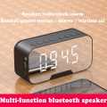 ALL IN 1 G10 Alarm Clock Bluetooth FM Speaker/Stereo Speakers/Hands-free Calling Support/Mirror Screen Dispaly/Support FM TF AUX / Phone Holder. 