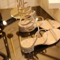 【ZOSR】 Gladiator sandals for women Ladies lace-up sandals 2022 new rhinestone snake -shaped belt sandals female summer rough -toe Roman entanglement and tie around the fairy style. 