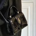 High-Grade Chain Bag Niche 2024 One-Shoulder Motorcycle Texture Portable Patent Leather Small Square Bag Crossbody New Women's Western Style. 