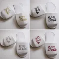 【WEJA】1pair Guest Hotel Slippers Wedding Party Team Bride Slipper Hotel Travel Spa Shoes New Gold Glitter Letter Flip Flop. 