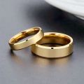 Fashion Classic Stainless Steel Men's and Women's Rings Gold Color Glossy Couple Rings Wedding Engagement Rings Jewelry Gifts. 
