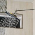 Adjustable Shower Arm Extension By, with Chrome Finish 11 Inch. 