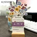 New Year Calendar 2024 Floral Desk Calendar with Wooden Base Monthly Planner for New Year Premium Quality Paper Desktop Decoration Buyers' Favorite. 