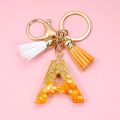 Orange Color 26 Initials Letter Keyrings with Tassels Handbag Key Chain Pendant Ornaments Acrylic Alphabet Keychains Accessories. 