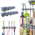 Multi-Functional Wall Mounted Mop Holder and Broom Hook Plastic Storage Rack for Bathroom Kitchen Laundry Room and Cleaning Supplies. 