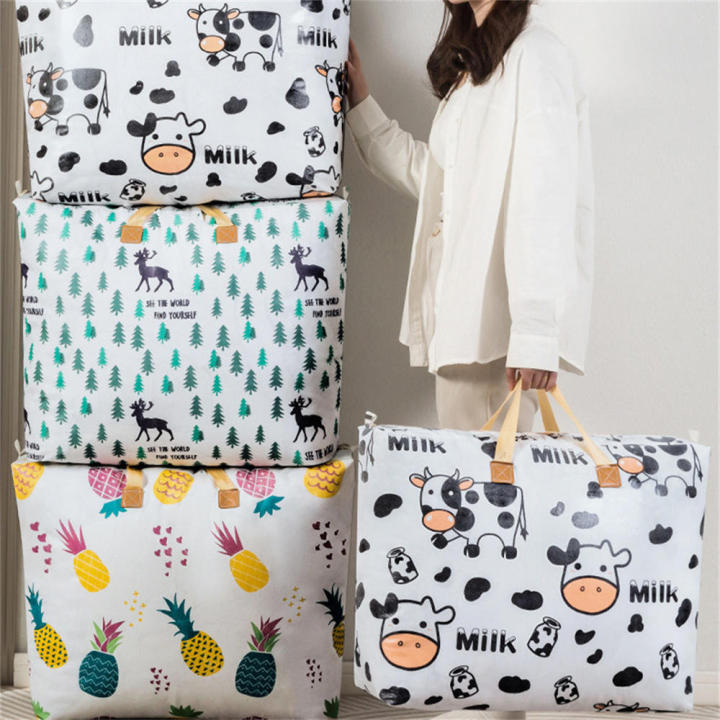 Foldable%20Portable%20Handbags%20Clothing%20Storage%20Solutions%20Cartoon%20Cow%20Printing%20Blanket%20Storage%20Bags%20Dustproof%20Wardrobe%20Organizer%20Bags%20Quilt%20Storage%20Bags%20-%20Image%204