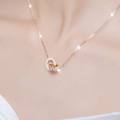 CELOVIS Athena Interlocking Zirconia Double Ring Pendant with Roman Numeral Chain Necklace for Women ( 18K Rose Gold/ Gold ). 