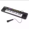 Electronic Keyboard Organ Piano 32 Keys With Mini Microphone Musical Instruments(null). 