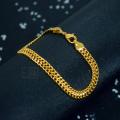 BOOM Gold plated baselet Stylish Rich Look pooran bracelet For Mwn and women. 