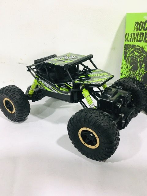 4WD%20Off%20Road%20Metal%20Rechargeable%20Monster%20Rock%20Crawler%20Car%20Truck%20Buggy%20Jeep%20Giant%20Rock%20Climber%202.4Ghz%201%20to%2014%20Scale%20Luxury%20Design%20High%20Quality%204%20Wheel%20Off%20Road%20Full%20Function%20-%20Image%205