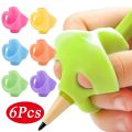 【HOT】 Pencil Grip Classics Ring Grip Ergonomic Writing Aid Trainer Posture Correction Finger Grip For Kids Children School Supplies. 