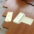 Laminate Flooring Spacer for Floating Floor Installation Subfloor Panels. 