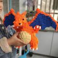 Compatible with LEGO bricks Pokémon Pokemon Charizard 3D puzzles children's toys birthday gifts. 