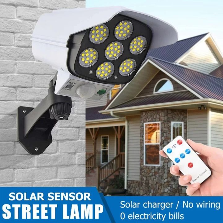 Solar%20Sensor%20Light%20CCTV%20Camera%20Type%20Security%20Sensor%20Light%20Outdoor%20Solar%20Light%20PIR%20Motion%20Sensor%20Wall%20Light%20Lamp%20With%20Remote%20Control%20IP65%20Waterproof%2077%20SMD%20LED%20CCTV%20Dummy%20Monitoring%20Light%20Garden%20Path%20Street%20Light%20-%20Image%202